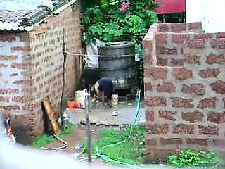 Watch This Two Lady Getting Bath In Outdoor...