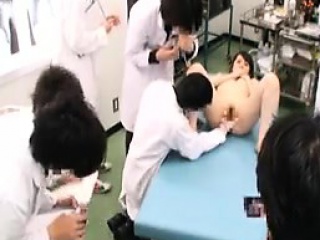 Slim Oriental Cutie Has A Group Of Doctors Examining Her Ha...