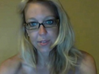 Sexy blonde nerd stripteasing and seducing on webcam at home