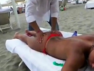 Voyeur Beach Massage Hot Sexy Asses...