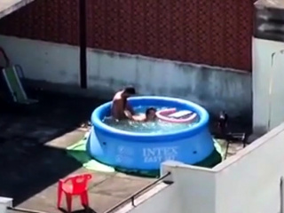 Girls watching couple fuck at pool...