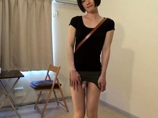 Crossdresser wearing a mini skirt