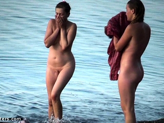 Voyeur tapes beauties at a naked beach