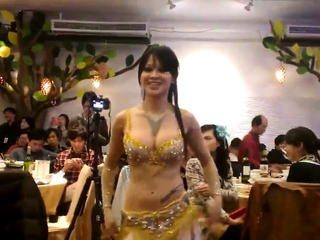 Sexy asian belly dancer shake her...