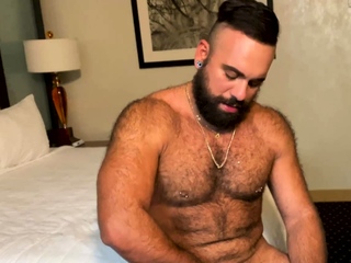 Furry muscle daddy stokes one for the camera