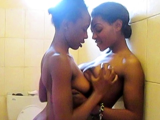 African cuties eating pussy in shower...