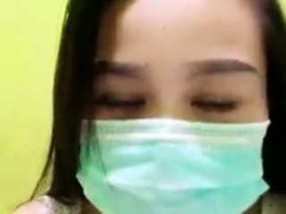 Playful Indonesian Hottie Wears A Facemask...