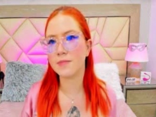 Cute red hair woman showing her cute little pussy