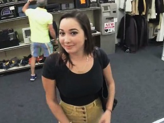 Sexy college girl flashes her tits in public in a pawn shop